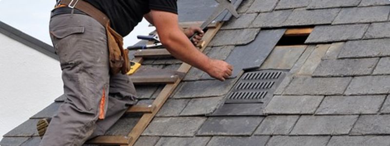 Small roofing repair by a roofer